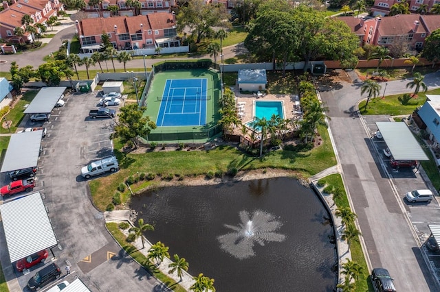 bird's eye view with a water view