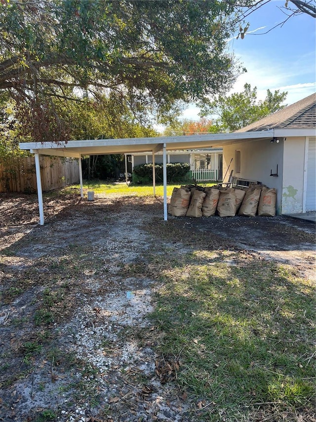 view of yard featuring a carport