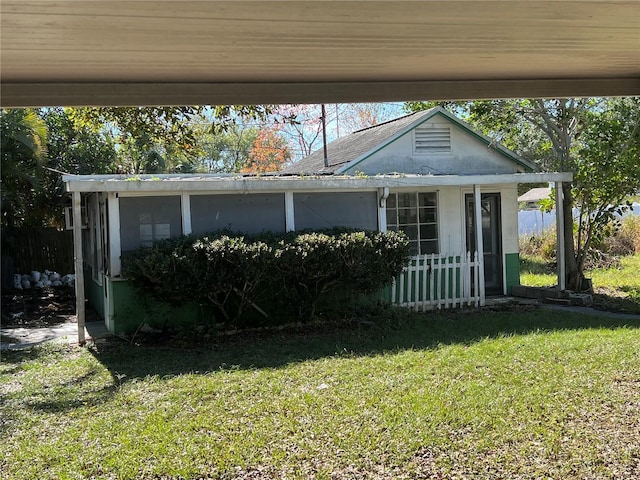 exterior space featuring a front lawn