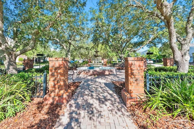 view of gate with fence