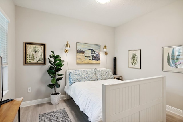 bedroom featuring hardwood / wood-style floors