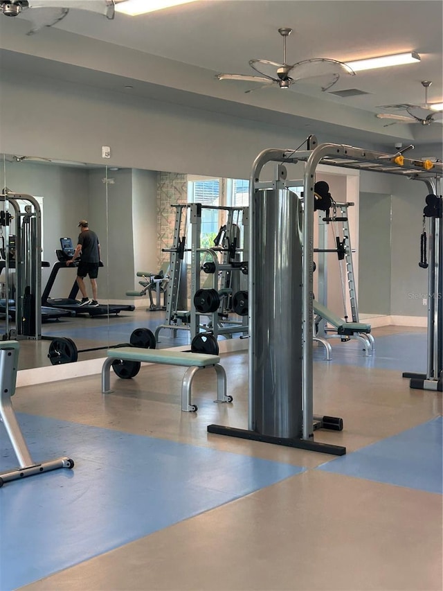 workout area with ceiling fan