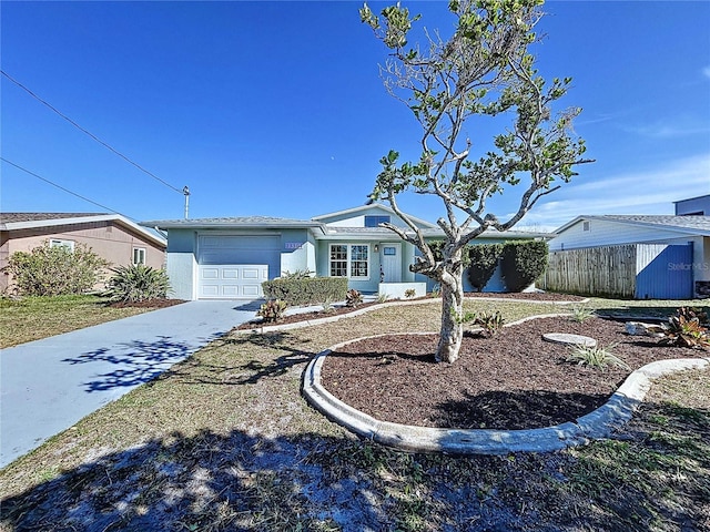 single story home with a garage