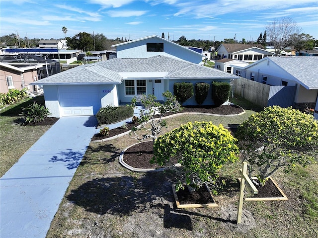 ranch-style house featuring a garage