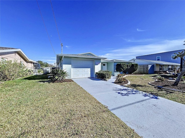 ranch-style house with a garage and a front yard