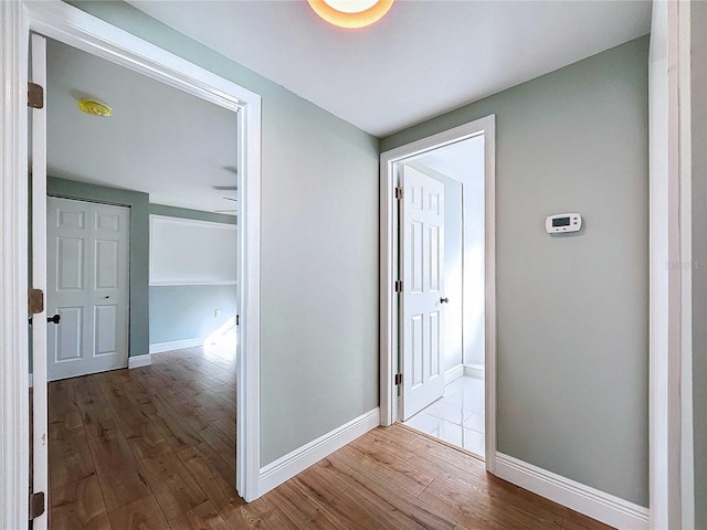 hallway featuring hardwood / wood-style floors