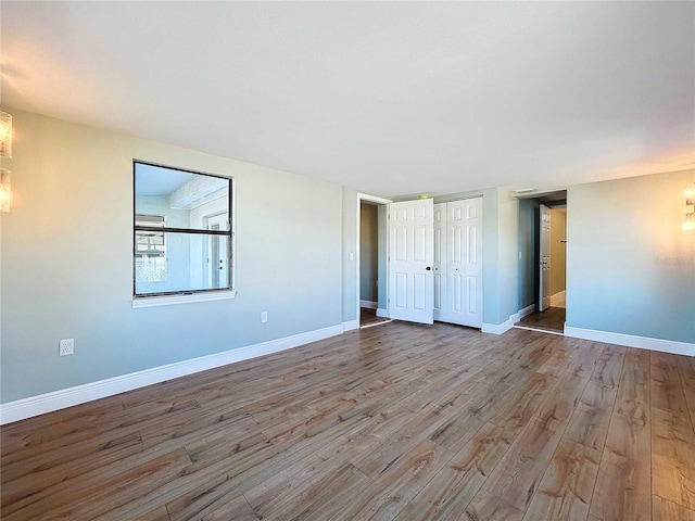 unfurnished bedroom featuring light hardwood / wood-style flooring