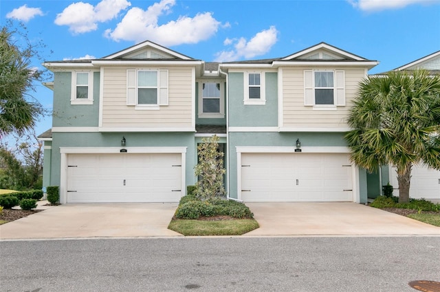 view of front of property with a garage