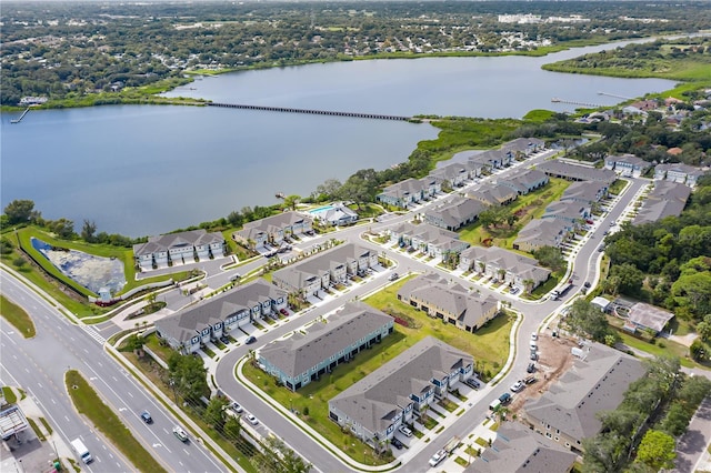 birds eye view of property featuring a water view