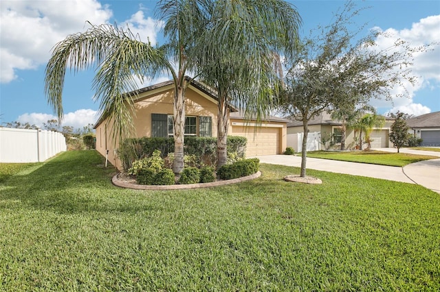 ranch-style house featuring a garage and a front yard