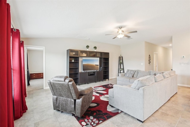 tiled living room with ceiling fan and vaulted ceiling