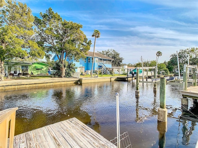 dock area featuring a water view