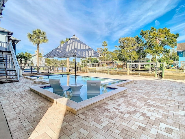 view of pool with a patio