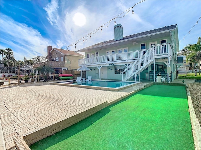 view of swimming pool featuring a patio area