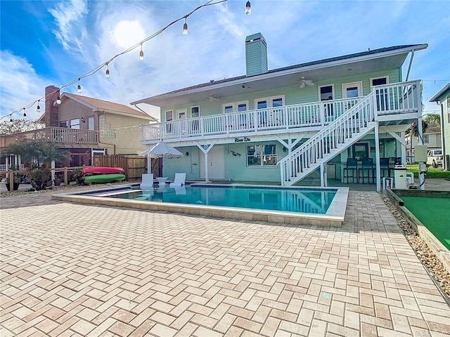 back of property with a patio area