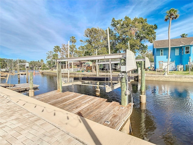 dock area with a water view