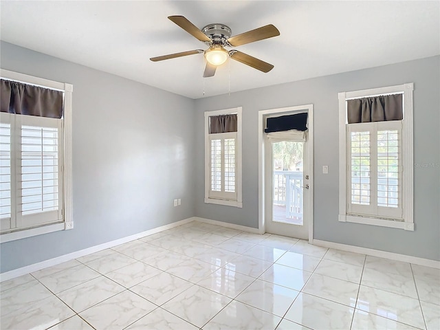 unfurnished room featuring ceiling fan