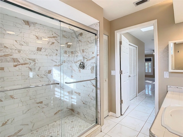 bathroom with vanity and walk in shower