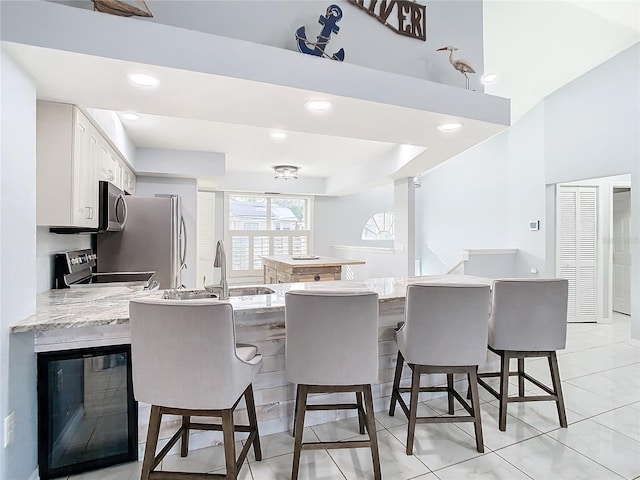 tiled dining area with sink