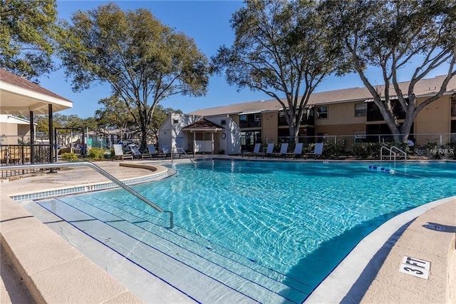 view of swimming pool featuring a patio