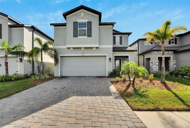 view of front of property with a garage