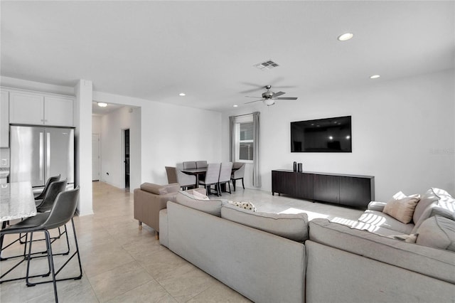 living room with ceiling fan