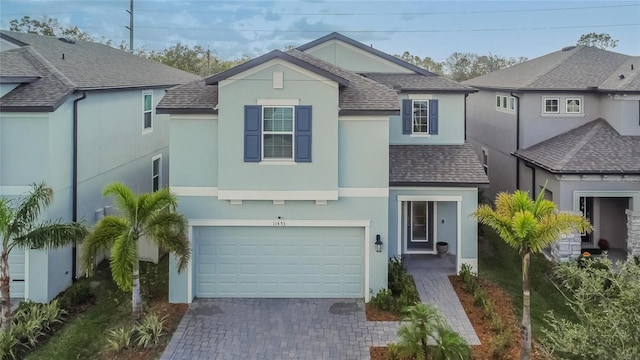 view of front of property with a garage