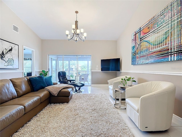 living room with a chandelier, vaulted ceiling, and light tile patterned flooring