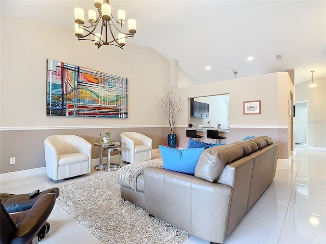 tiled living room featuring vaulted ceiling, a notable chandelier, and sink