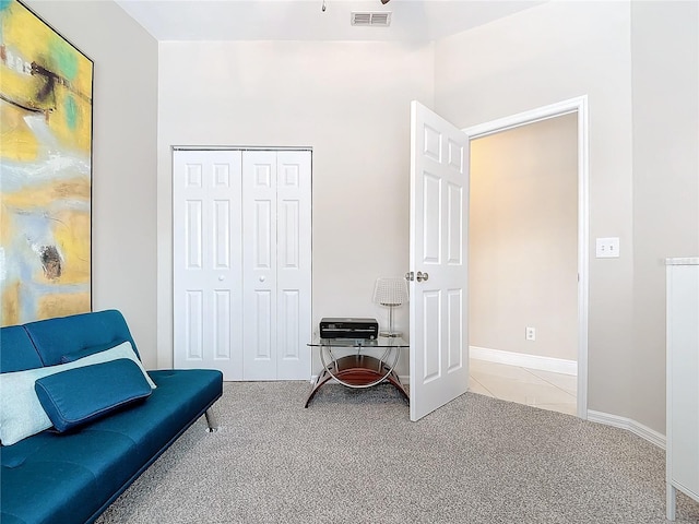 sitting room with light carpet