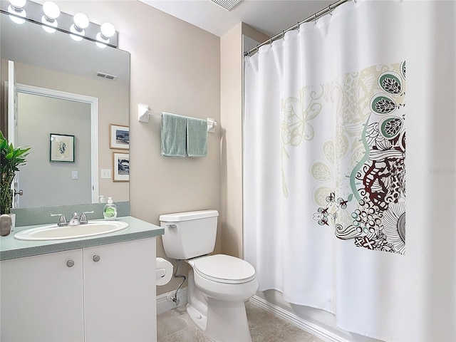 full bathroom with shower / bathtub combination with curtain, tile patterned flooring, vanity, and toilet