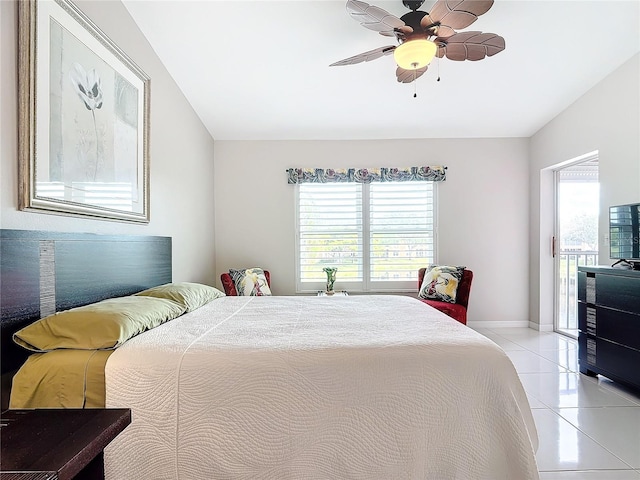 bedroom with ceiling fan and light tile patterned floors