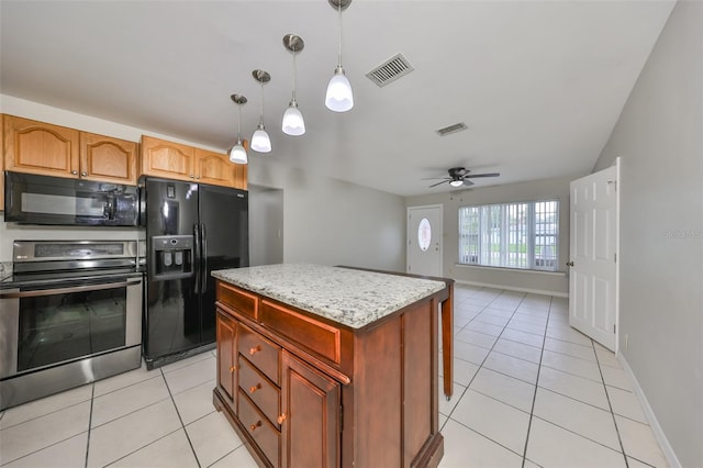 kitchen with pendant lighting, black appliances, a kitchen island, light tile patterned flooring, and ceiling fan