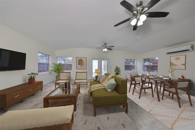 living room with lofted ceiling, a wall mounted AC, french doors, and ceiling fan