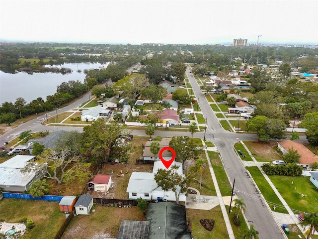 bird's eye view featuring a residential view and a water view