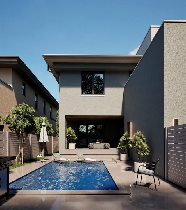 view of swimming pool with a patio