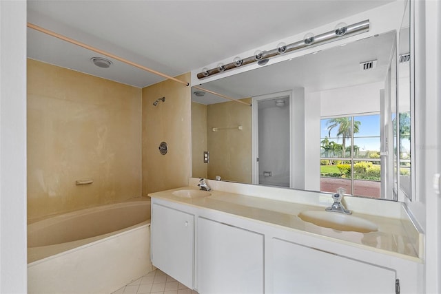 bathroom with tile patterned floors, vanity, and shower / bath combination