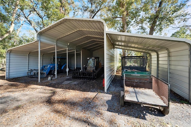 view of vehicle parking with a carport