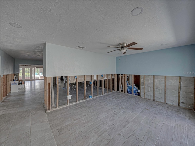 unfurnished room featuring ceiling fan