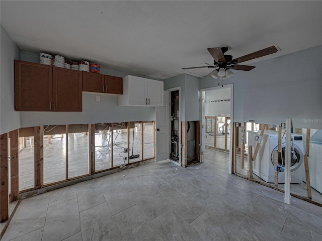 clothes washing area featuring ceiling fan and washer / clothes dryer