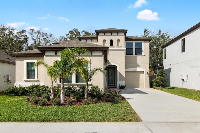 14672 Horse Trot Rd, Lithia, FL 33547 - mediterranean / spanish home featuring stucco siding, driveway, a front lawn, and a garage