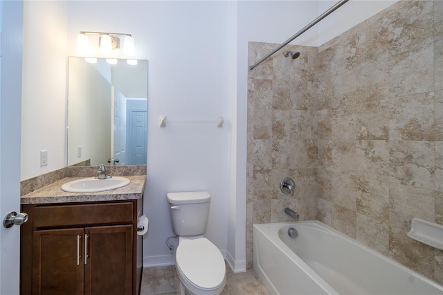 full bathroom featuring vanity, tile patterned floors, tiled shower / bath combo, and toilet