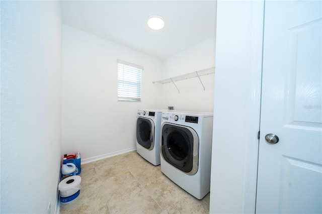 laundry area featuring independent washer and dryer