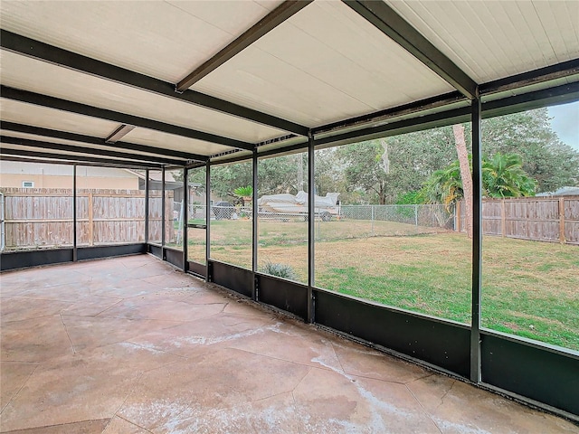 unfurnished sunroom featuring a wealth of natural light