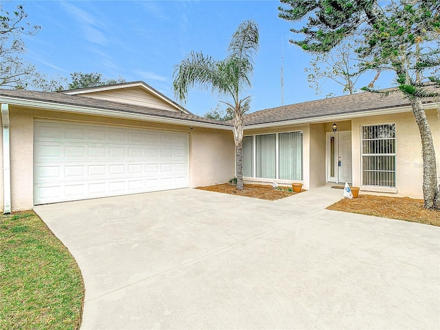 single story home with a garage