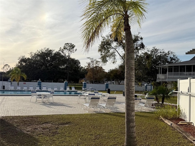 exterior space with a patio and a community pool