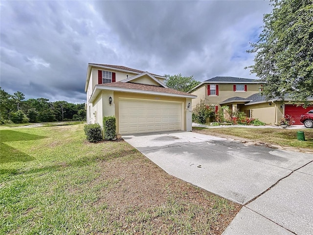 view of front of home with a front yard and a garage