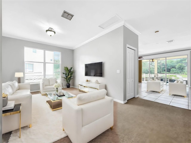 carpeted living room with crown molding