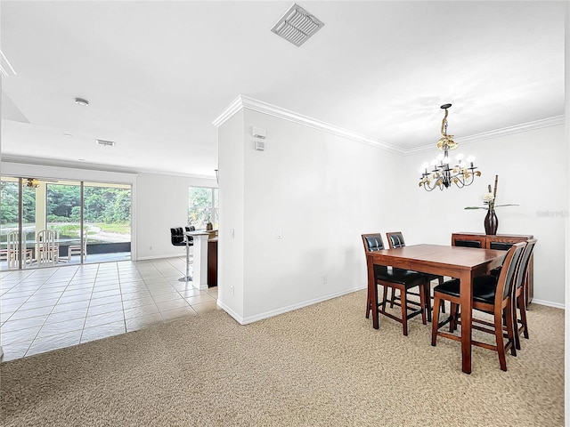 carpeted dining space with a chandelier and crown molding