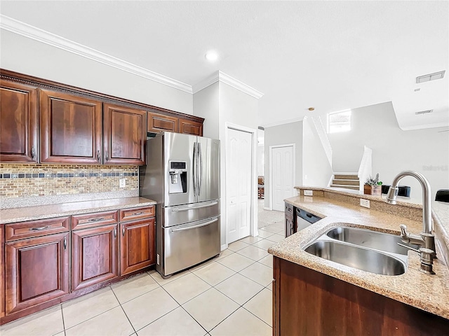 kitchen featuring light tile patterned flooring, crown molding, stainless steel fridge with ice dispenser, and sink